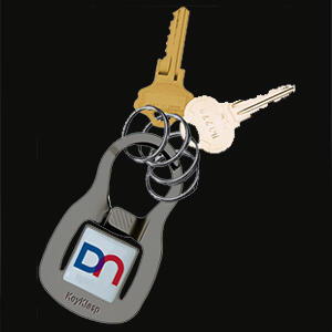 Matte Black keyholder Solid metal (brass) squeeze type key chain with 4 key rings. This key management system is far superior to the traditional key ring. Just squeeze the metal thumb pads and remove keys effortlessly. No more torn fingernails! Elegant and